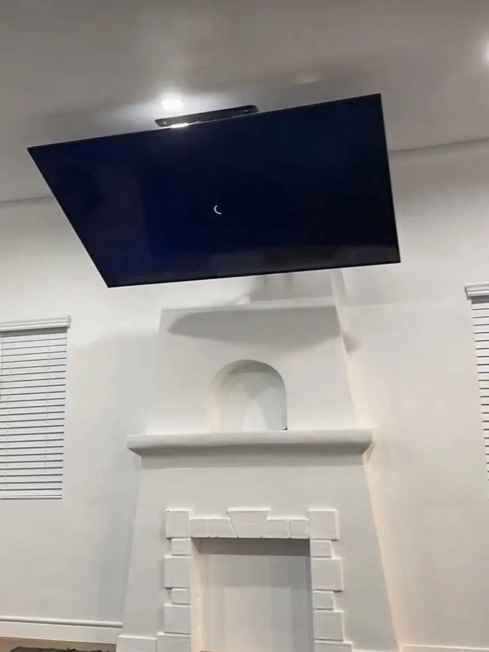 Full motion mount above fireplace angled TV